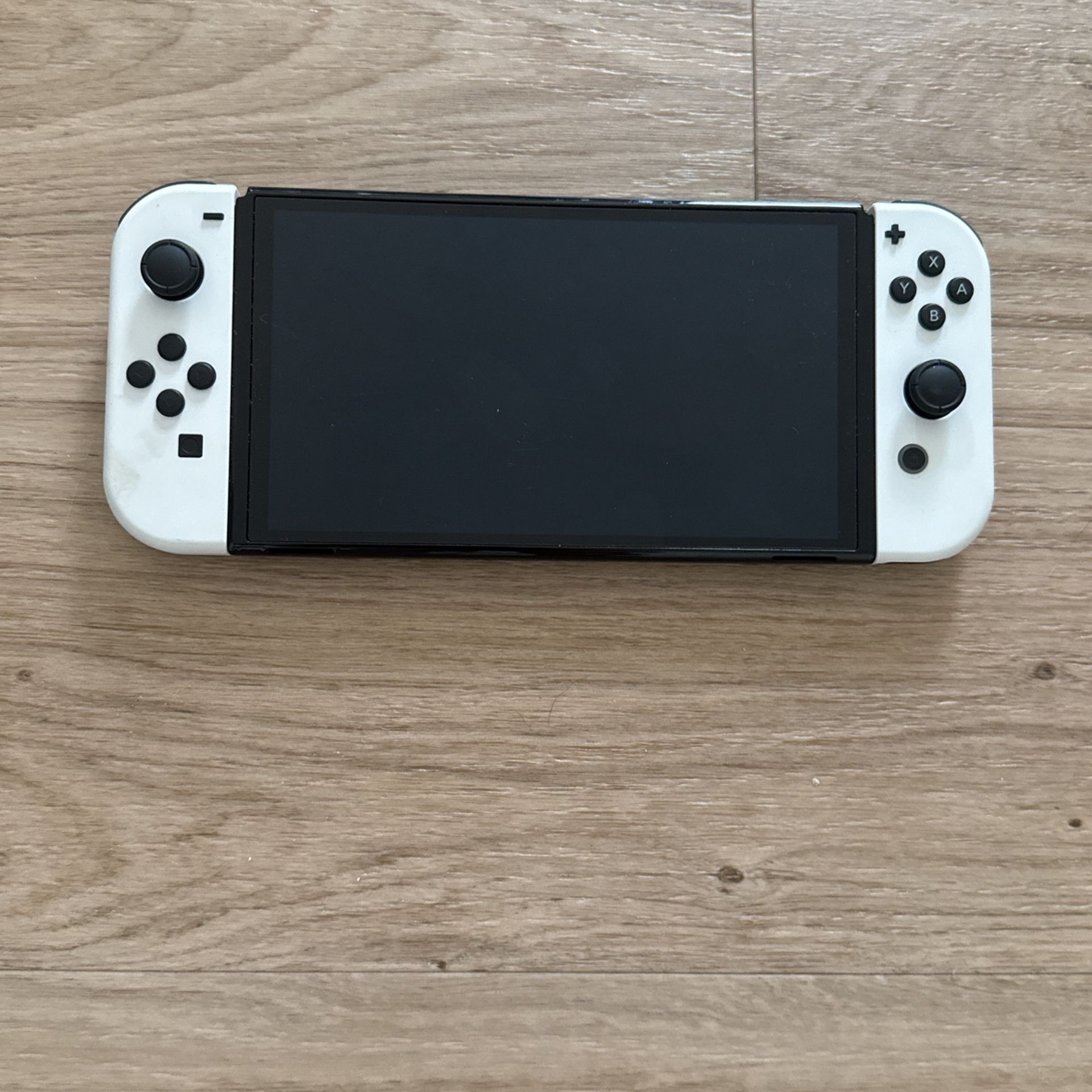White Nintendo Switch OLED 64 GB