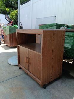 Vintage Wooden Rolling storage cabinet $95 obo!