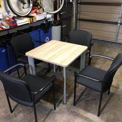 Table And 4 Stackable Chairs 