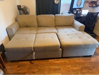 Sectional couch with storage and pull out
