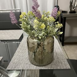 glass vase with flowers / home decor