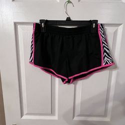 Black and pink athletic shorts, size large