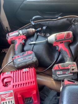 Milwaukee impacts w batteries and charger