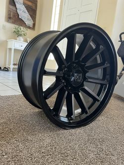 (1) 20x10 KMC XD855 Gloss Black And Machine Rim: 6x139.7/6x5.5, -18mm Offset