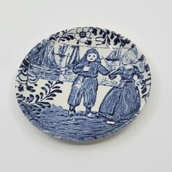 Vintage Delft Boch Small Blue & White Porcelain Trinket Plate 4.25" Boy 
and Girl Floral.  Pre-owned, very good shape, no chips or cracks.  
Diameter 