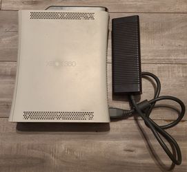 XBOX 360 console only. No cables. Unknown condition.