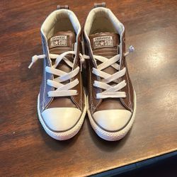 Converse “Chuck Taylor”  Mid top Tennis shoes