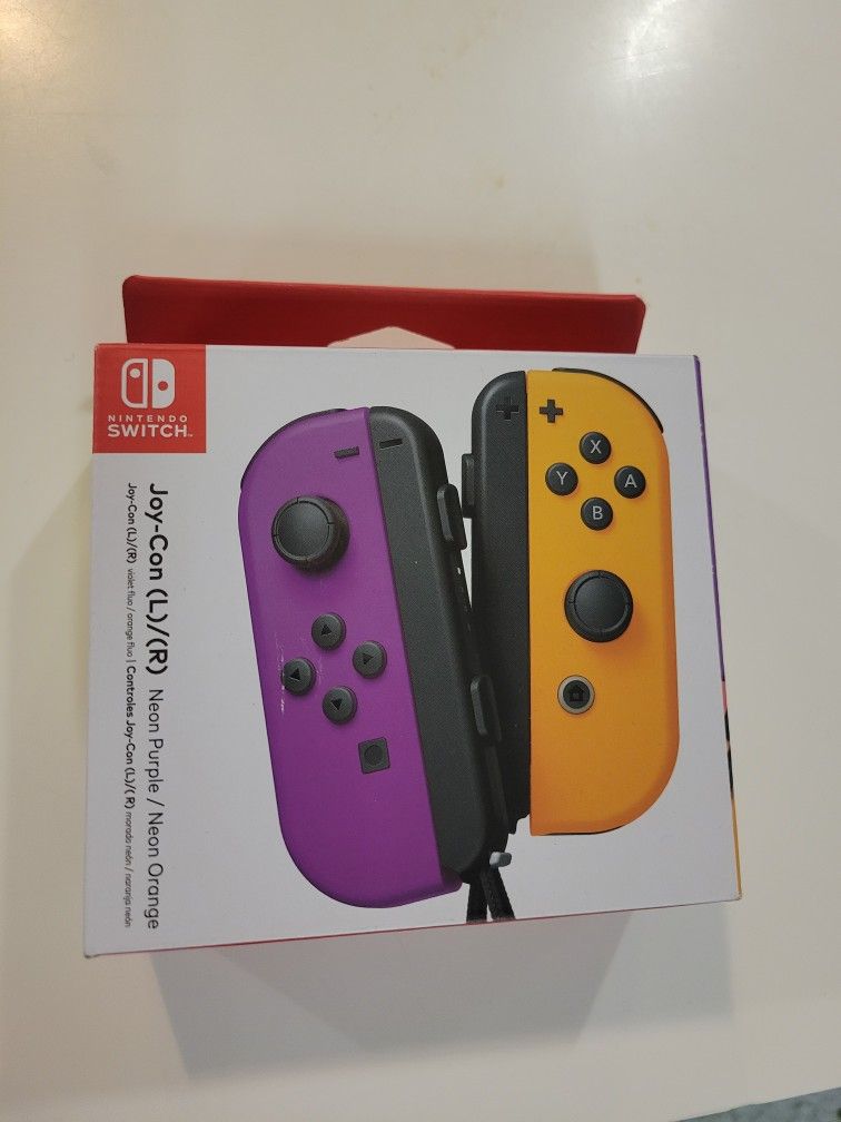 Nintendo Switch Joycons L & R Purple And Orange 