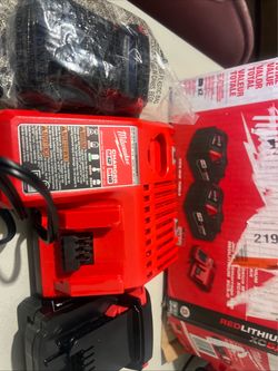 Milwaukee 2 batteries and charger
