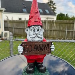 Gnome  Holding Go Away Sign