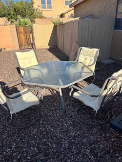 Patio set glass table four swivel chairs new cushions