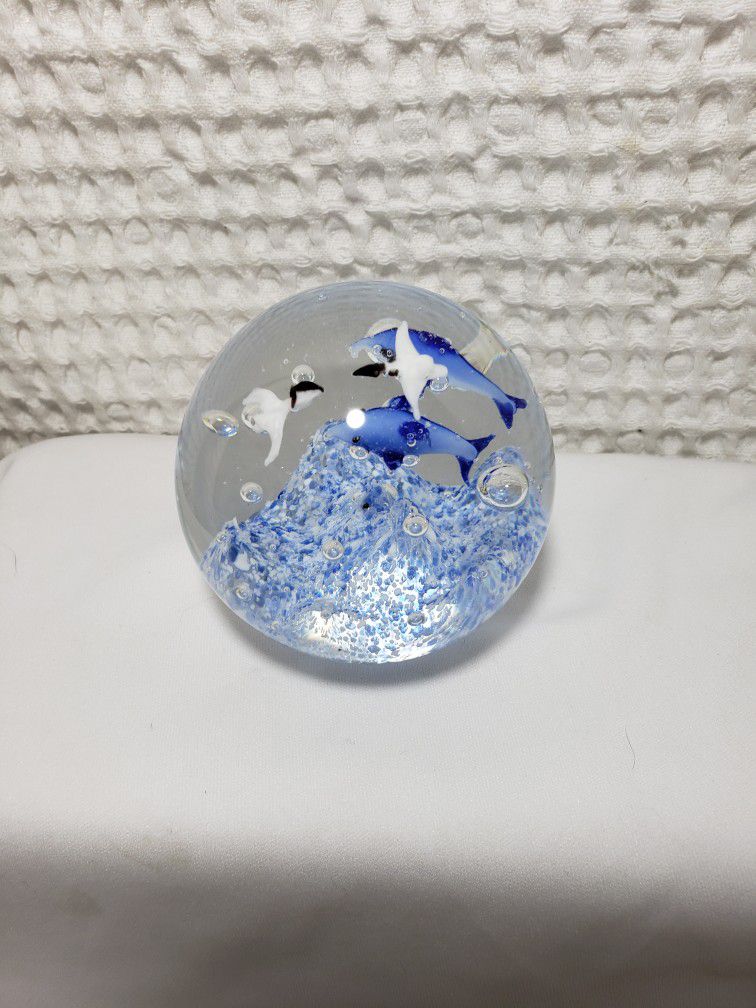 Art Glass globe sealife dophines and pelicans paper weight . 
