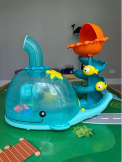 Ball popper- musical whale toy