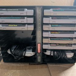 Super Nintendo (SNES) Game Bundle – 9 Games + 2 Original Controllers + Storage Rack