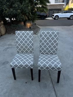 Two beautiful Grey / White Fabric Wooden Chairs