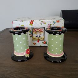 pair of candle holders but Michelle  co.
