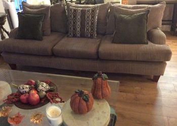 Cozy gently used neutral colored couch