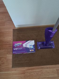 Swiffer wet jet mopping pads with mop
