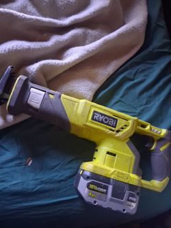 Ryobi sawsall with 4.0 ah battery and ryobi fast charger