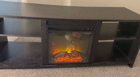 Mesa para tv y chimenea