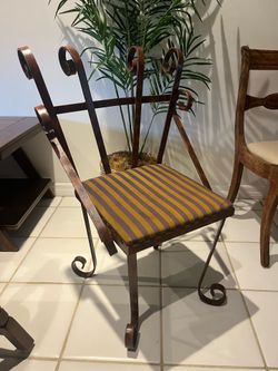 Wrought-iron accent art chair