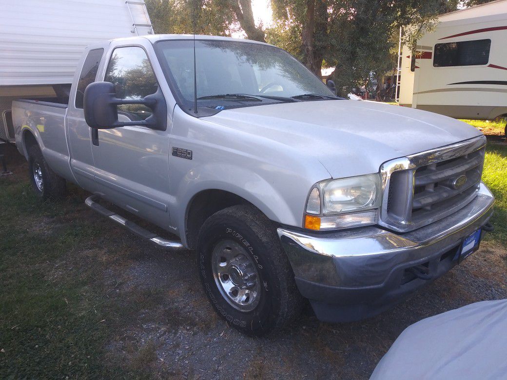 02 F-250 extended cab 4 door two wheel drive