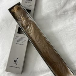 HerStyler Elite Extension Instant Clip hair extensions. 