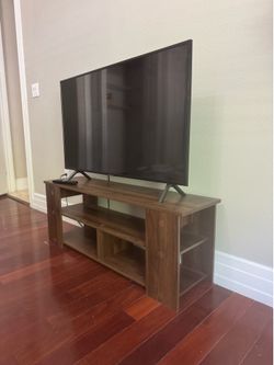 Smart TV (Samsung) + shelf