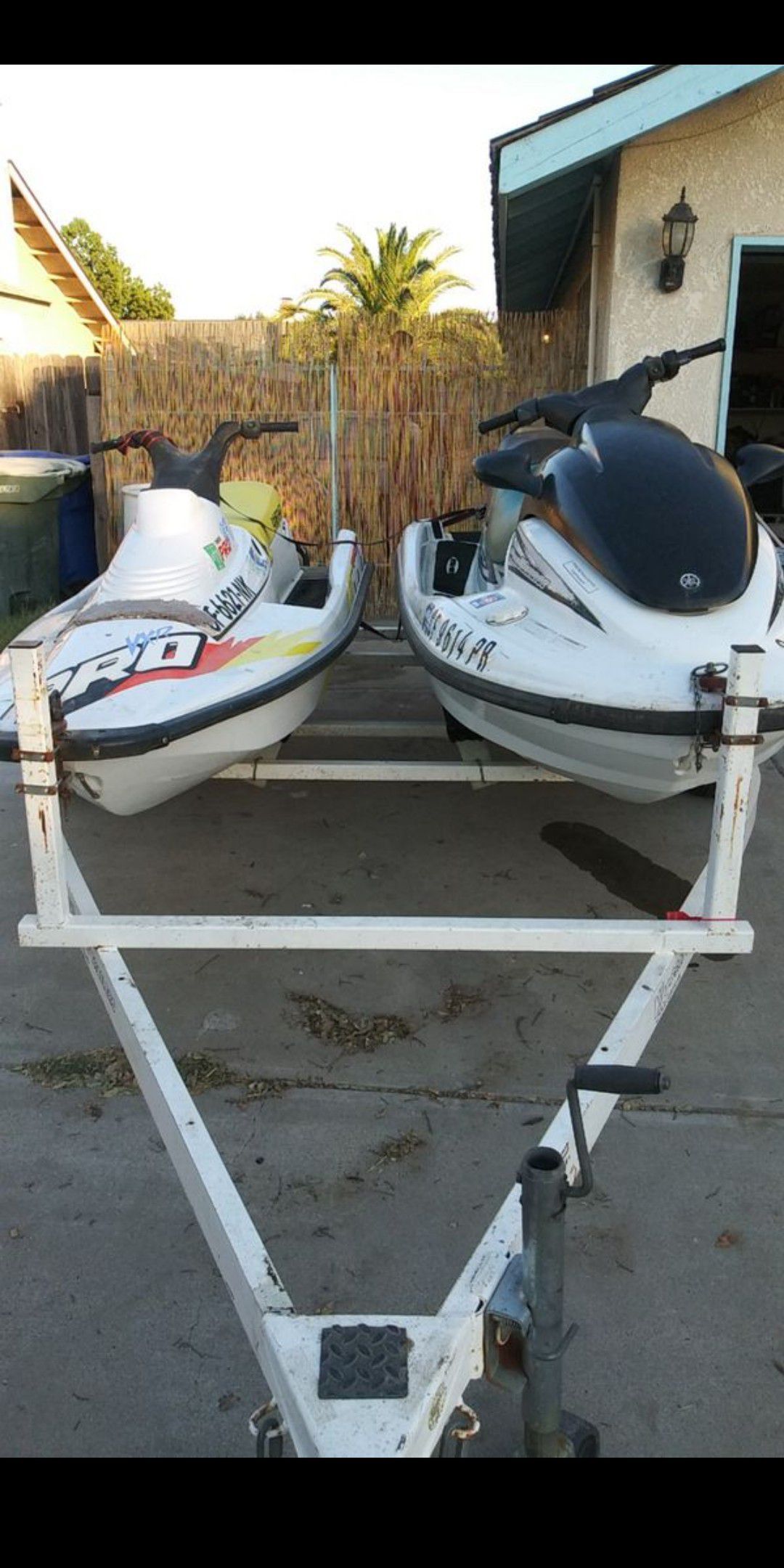 3 jet skis and trailer