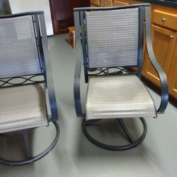 2  Swivel Patio Chairs