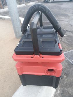Milwaukee M18 Cordless Wet/Dry Vacuum and packout light charger tower