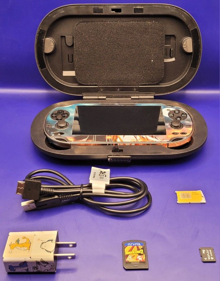 Pre-owned Excellent, PS Vita Bundle W/ Borderlands 2