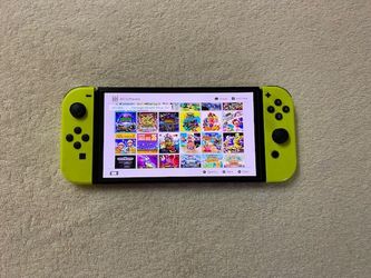 NINTENDO SWITCH OLED Loaded with 120 POPULAR SWITCH GAMES