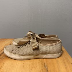 Gold Sperry shoes