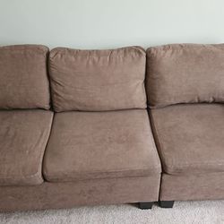 brown couch & ottoman 