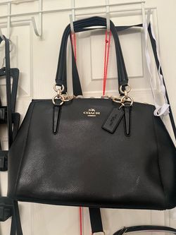 Leather coach handbag