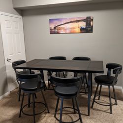 Beautiful 6 Chair Dining room glass table set with built-in wine rack