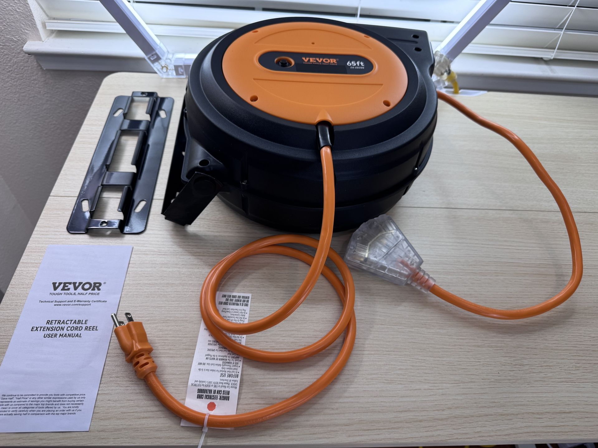 Brand New VEVOR Retractable Extension Cord Reel, 65 FT, Heavy Duty 12AWG/3C SJTOW Power Cord, with Lighted Triple Tap Outlet, 15 Amp SKU139-S1