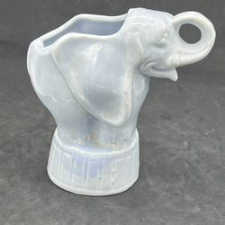 VINTAGE Blue/Gray NILOAK Circus ELEPHANT 5 1/2" tall PLANTER   This vintage NILOAK planter features a charming blue/gray elephant design, perfect for 