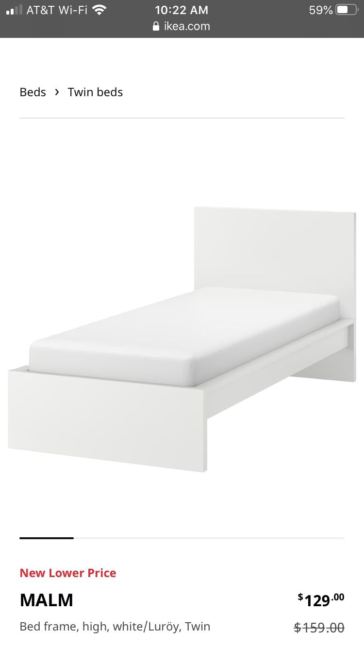 IKEA twin malm bed with mattress and rolling drawers underneath