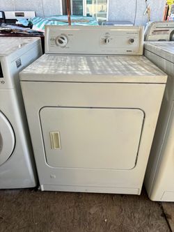 Gas dryer brand Kenmore heavy duty everything works great with a 3 months warranty