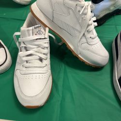 reebok classic leather shoes in white with a gum sole kids