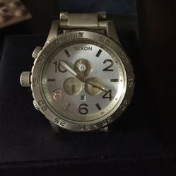 Nixon 51-30 light gold.