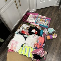 Box Filled With Girls Clothes And Toys