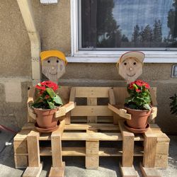 Two Man Plant Holder 