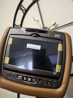 2 tan car headrest with TV/DVD Player