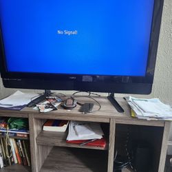 TV AND STAND $200