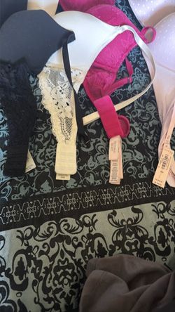 5 padded bras , 1 swim suit top and sports bra