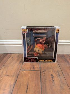 New unopened Cyndi lauper Funko Pop and hard case.