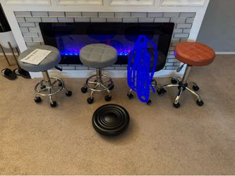 Various Rolling Stools! Gray and Orange ones are height adjustable!